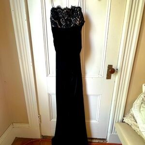 Black velvet dress with slit up to thigh